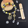 Lime and black cube bead bracelet with gold pavé lock and clover key charms on dark background - LoyatobsCreations.com