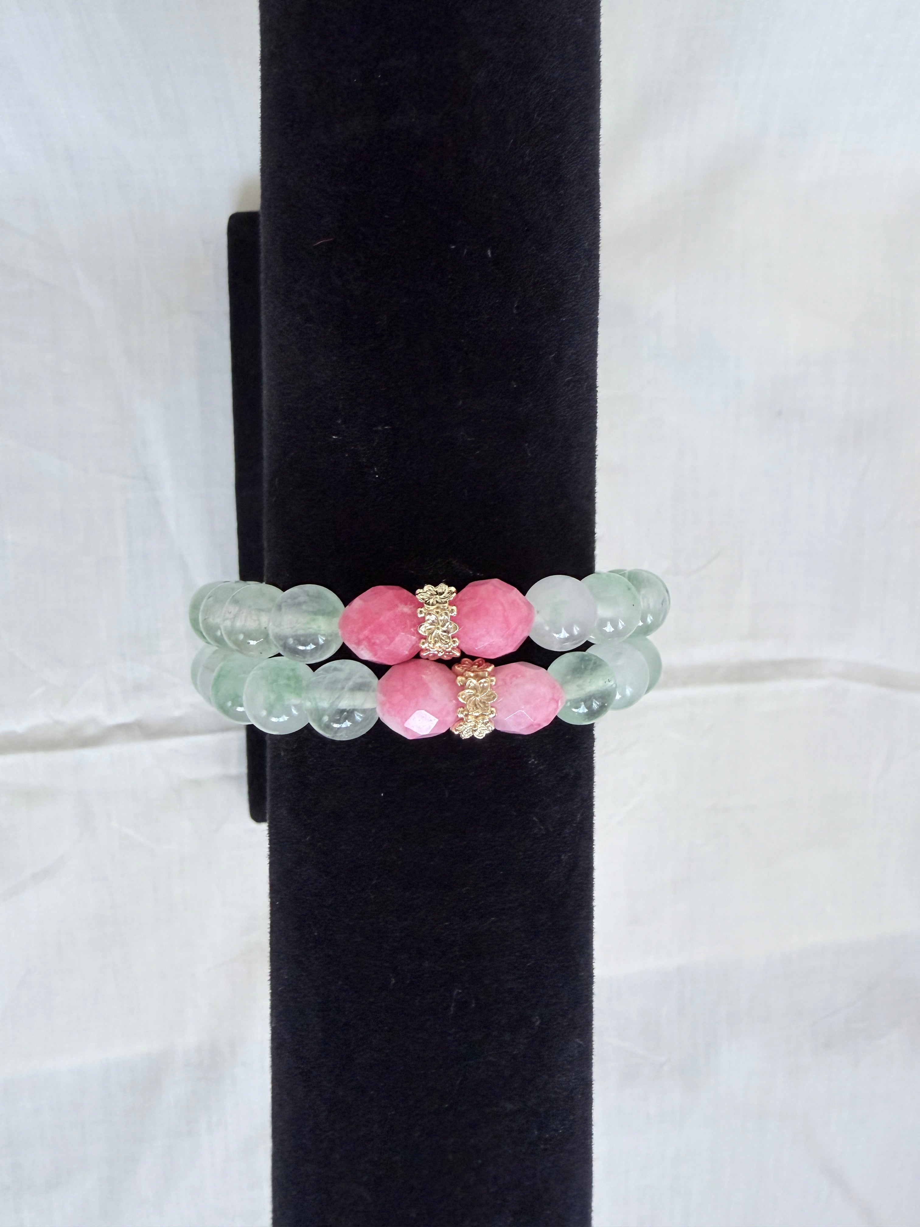 "Two mint green jade and candy bracelets stacked on black velvet stand showing how they look layered together with pink candy beads and gold CZ rondelles"