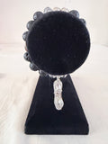 She Walks in Beauty Charm Bracelet on black velvet stand showing silver rhinestone stiletto heel charm with black lava stone and clear crystal beads