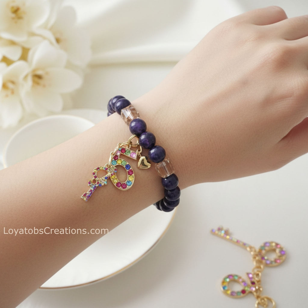 "Purple and champagne crystal charm bracelet with multicolour rhinestone charms worn on wrist, lifestyle jewellery photography" - LoyatobsCreations.com